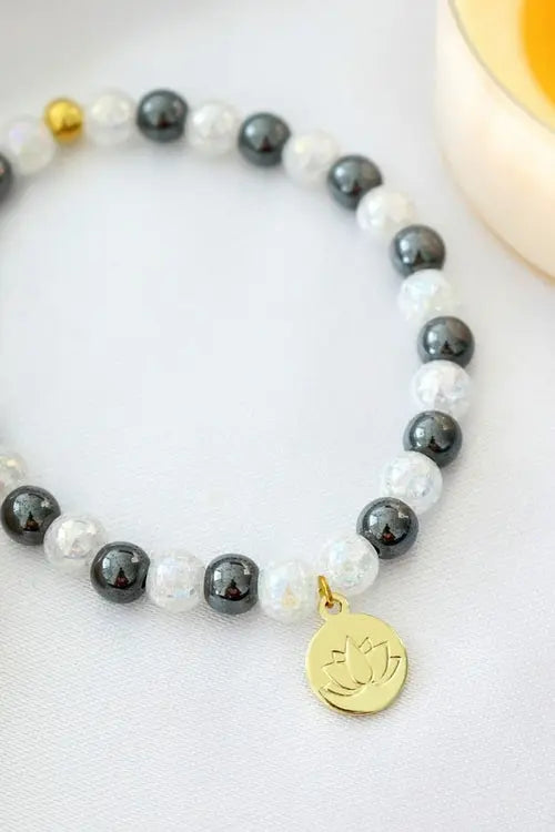 Hematite Elastic Bracelet | 24K Lotus Flower Charm FashionMojos.com